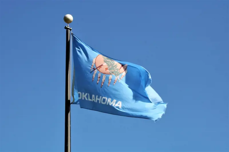 oklahoma-state-flag-on-blue-sky